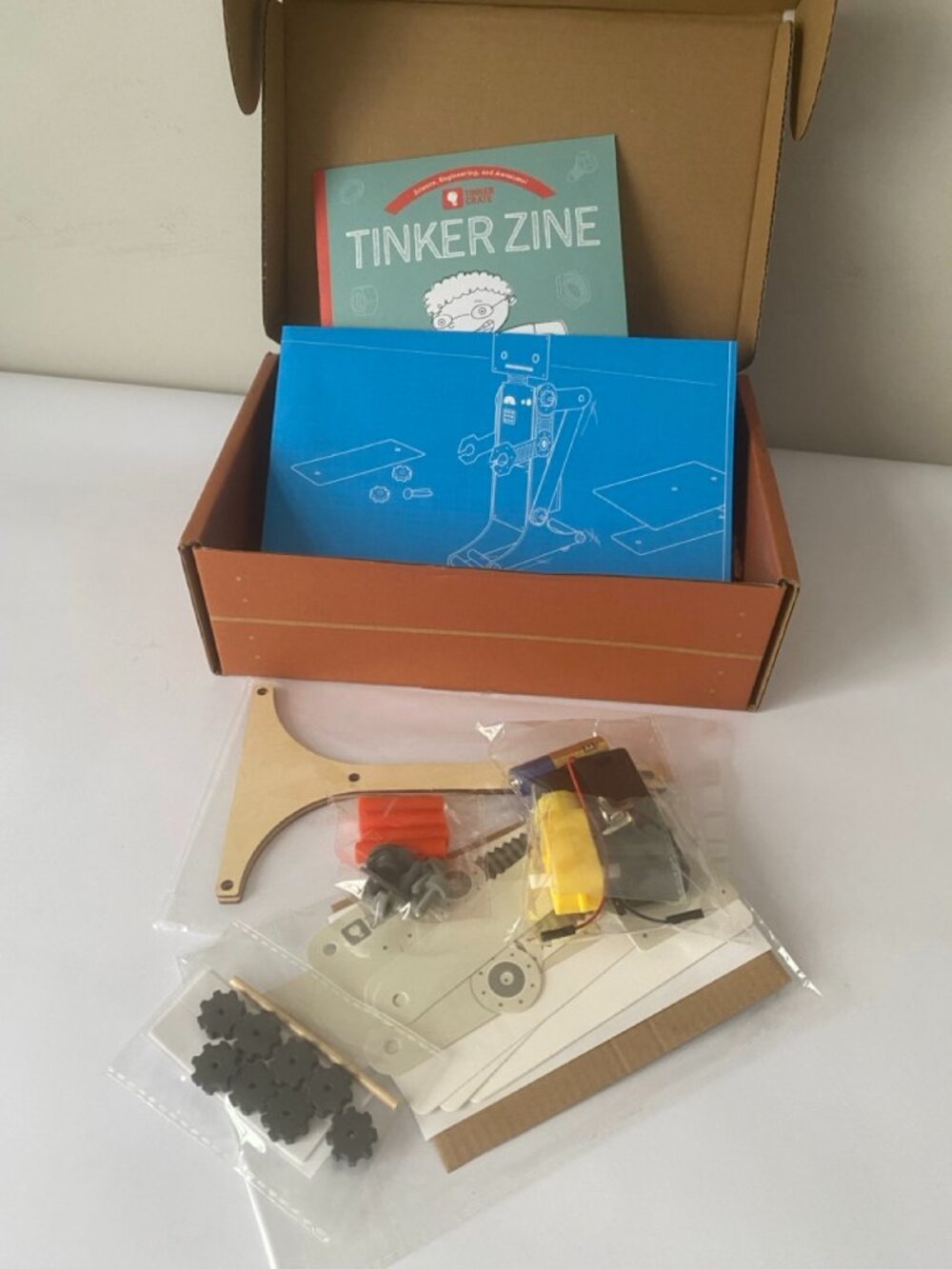KiwiCo Tinker Crate Walking Robot build kit. Recommended ages 9+.